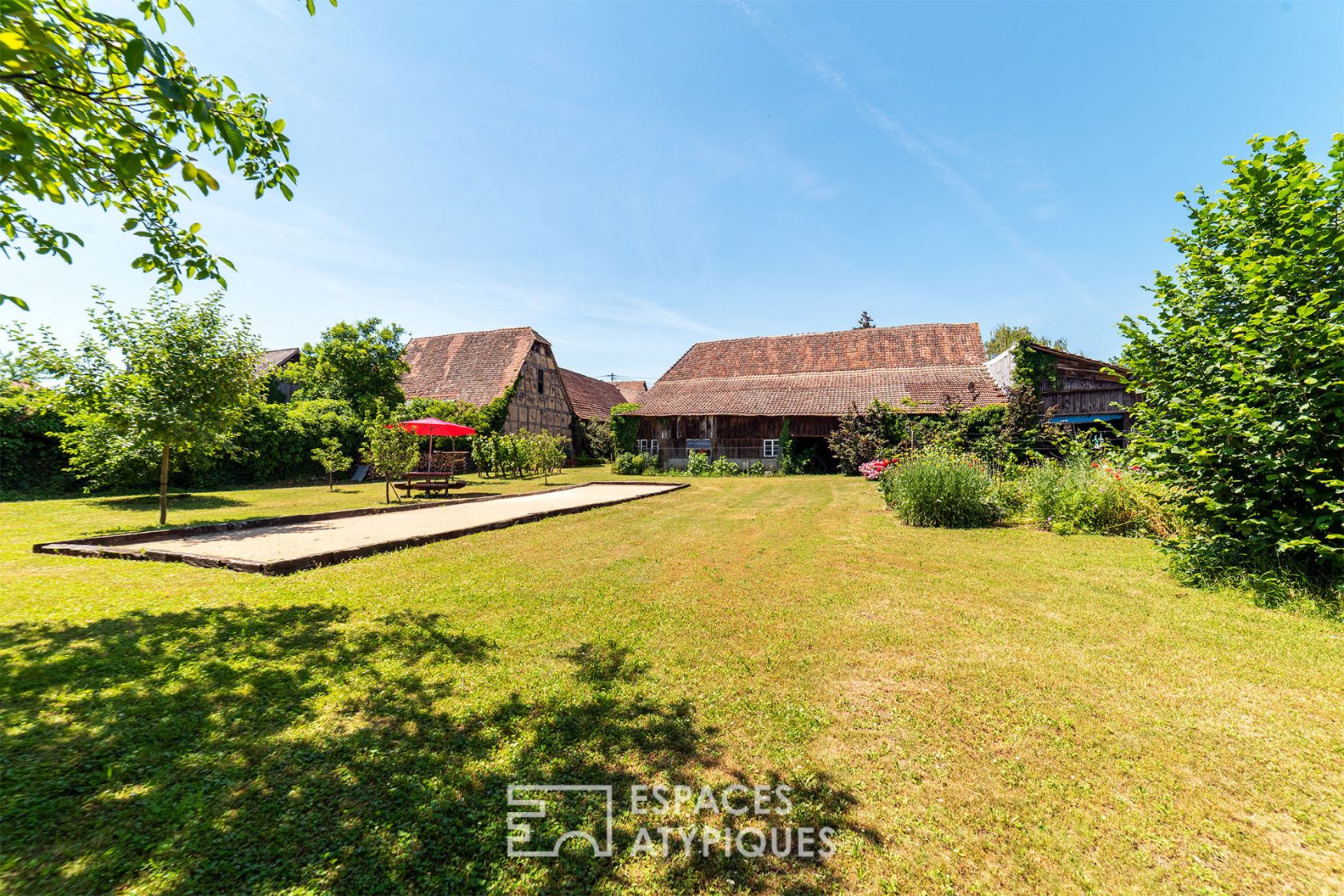Renovated farmhouse and its guest rooms