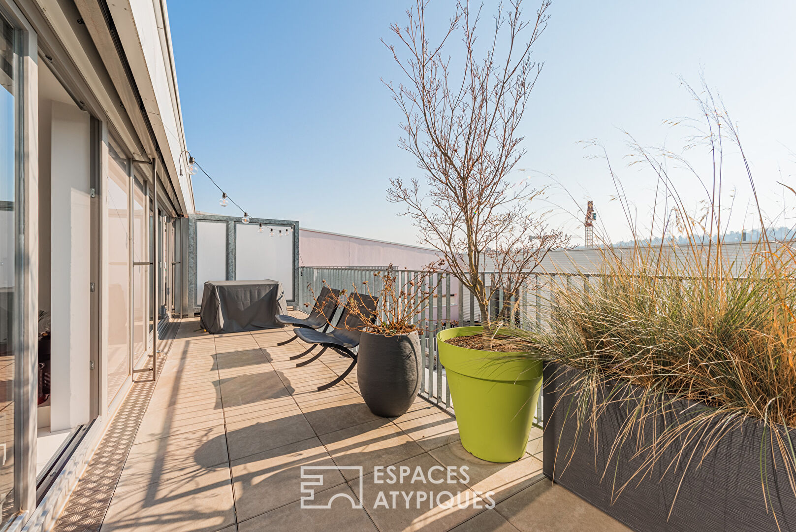 Authentique loft et sa terrasse sur les toits