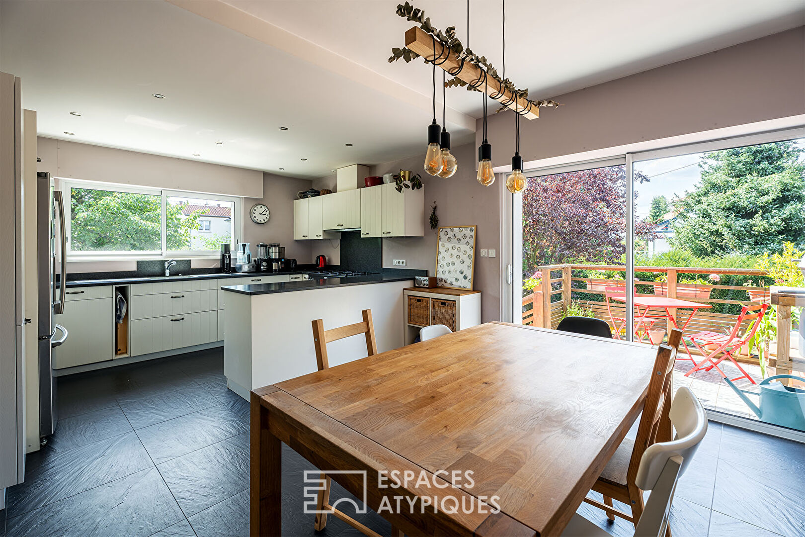 Renovated 1950s house and its garden