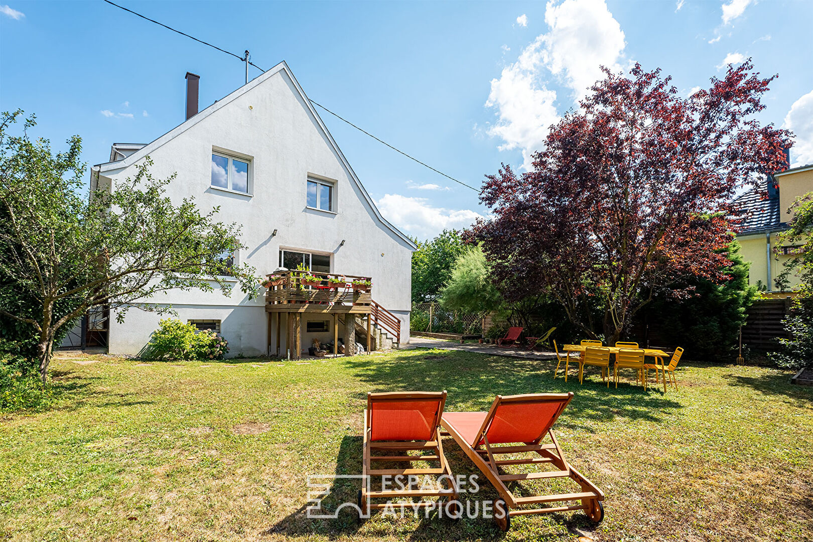 Renovated 1950s house and its garden