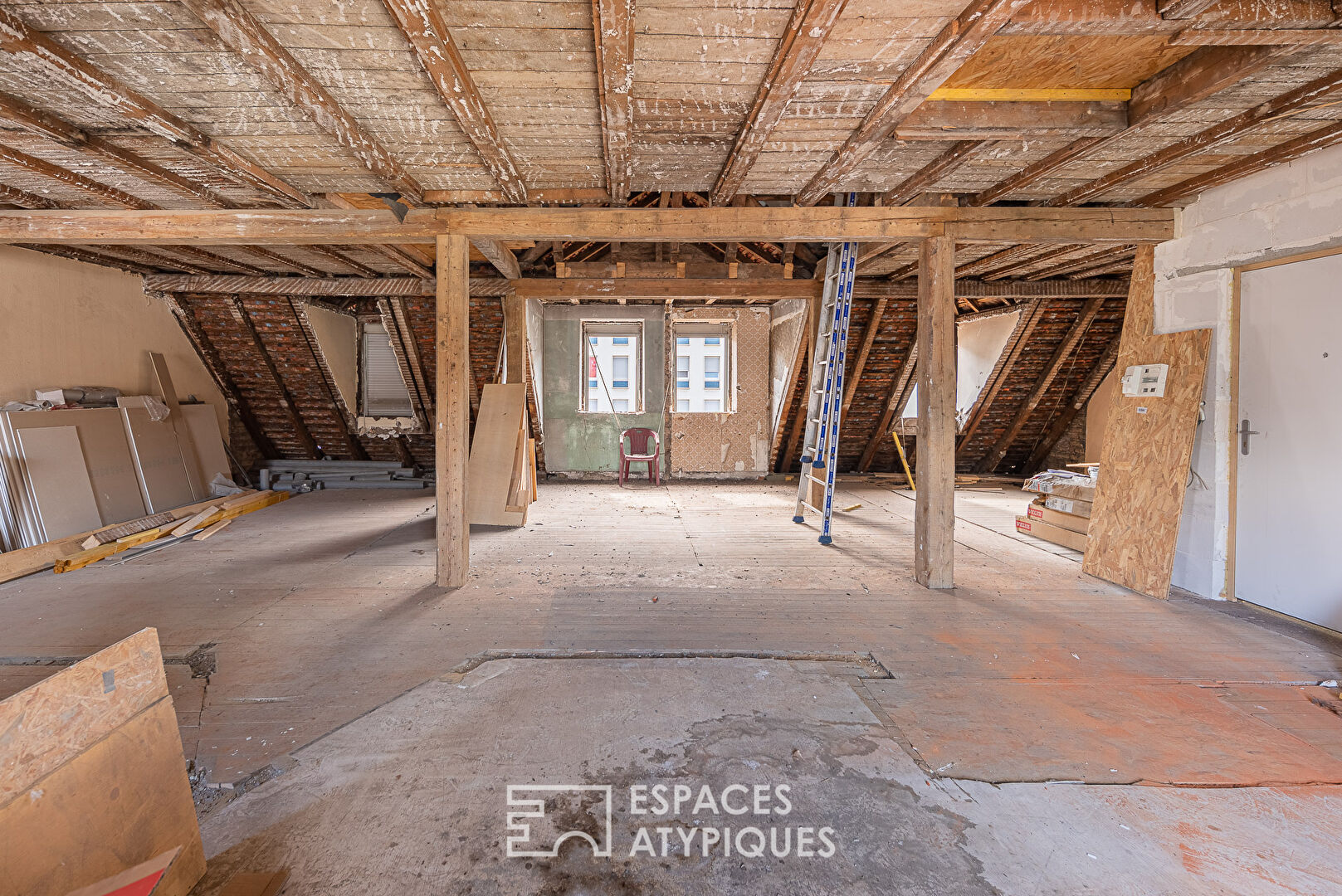 Rough-cut flat under the roof