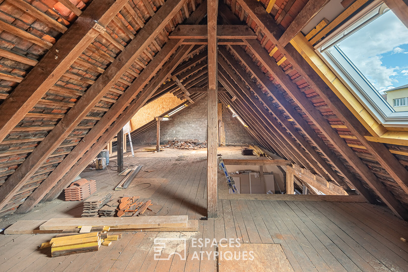 Rough-cut flat under the roof