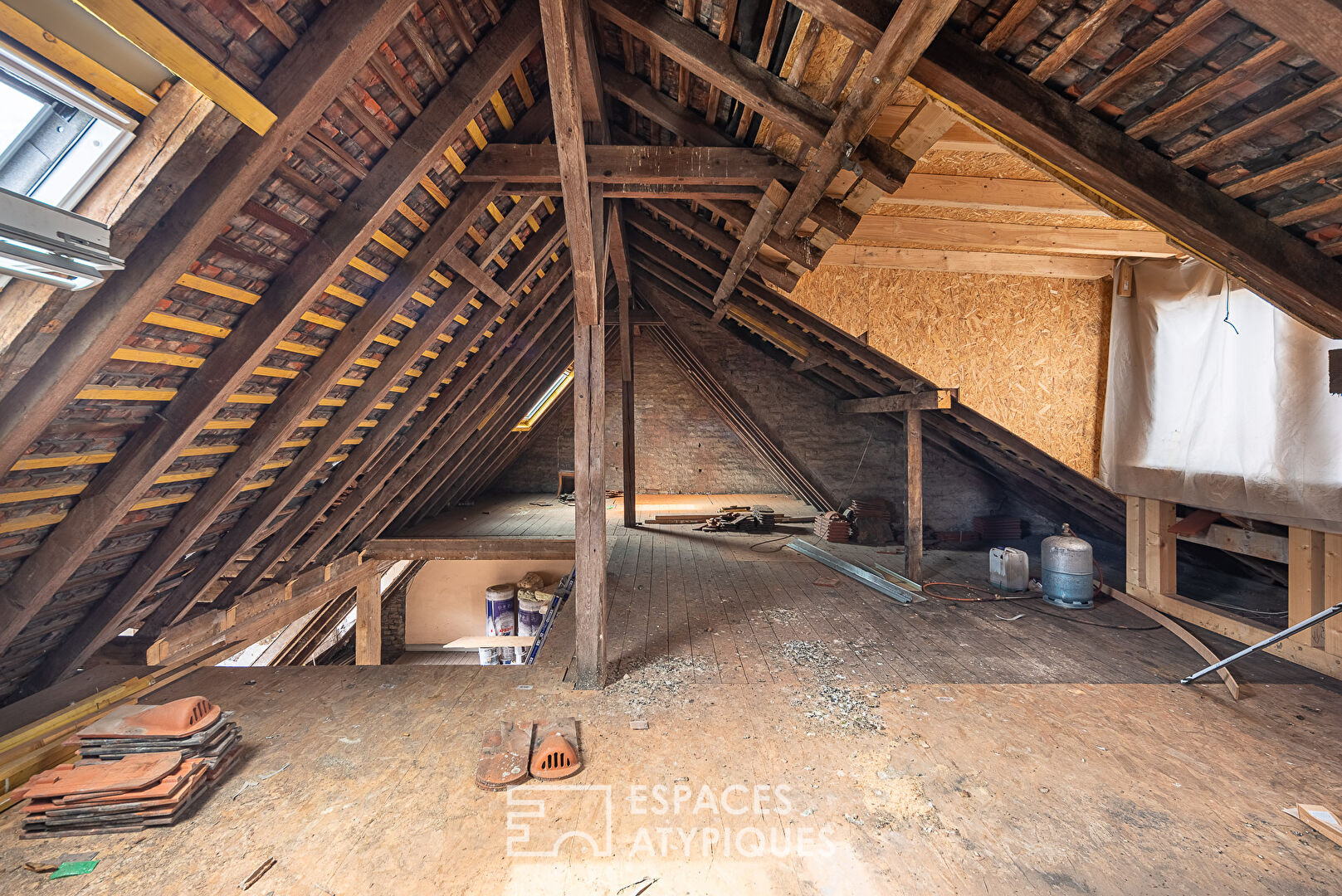 Rough-cut flat under the roof