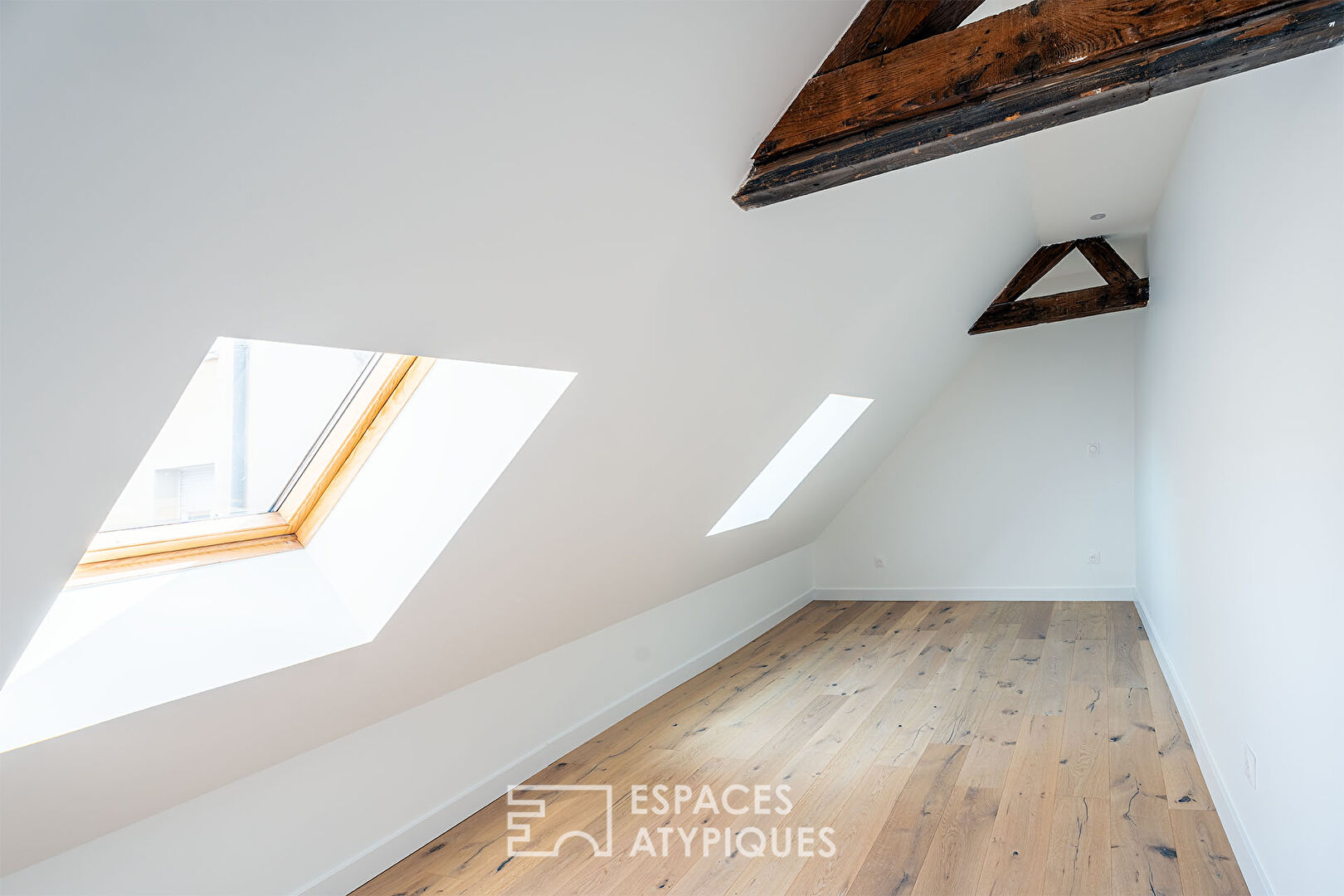 Renovated duplex nestled under the roofs