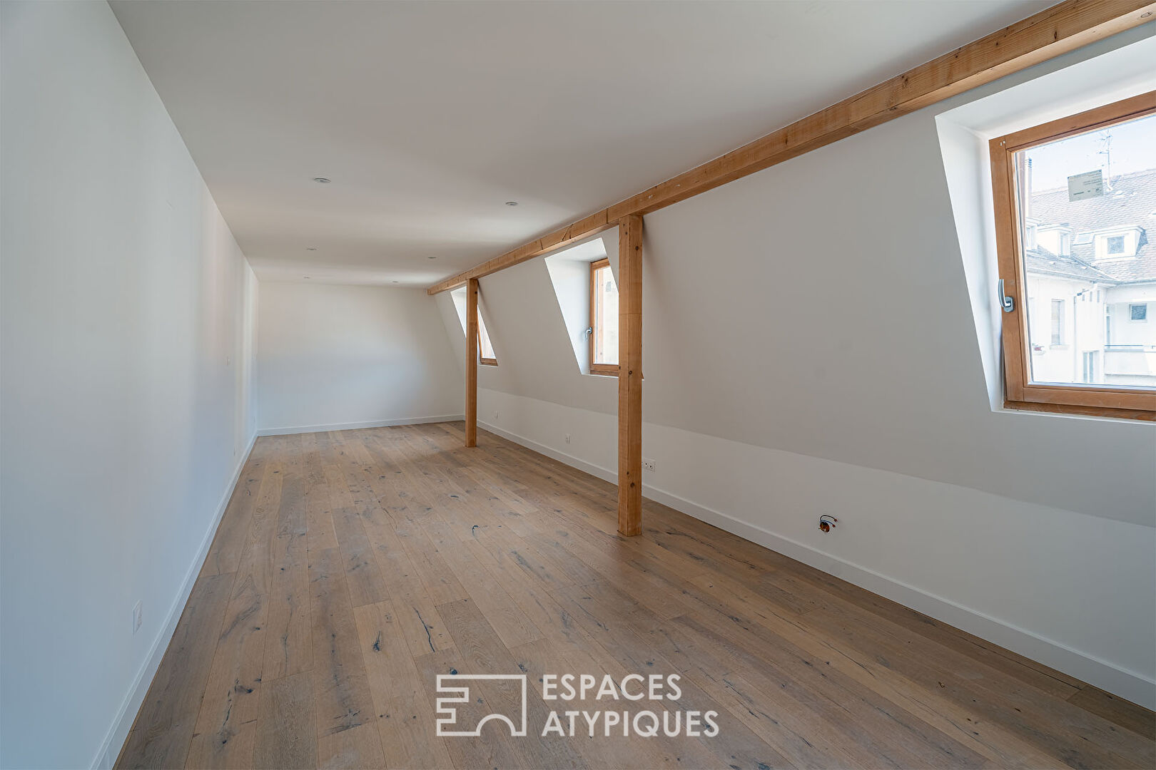 Renovated duplex nestled under the roofs