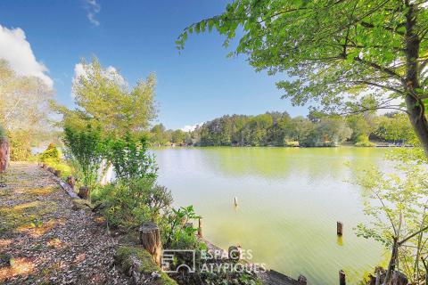 Chalet en bois avec terrasse et vue lac
