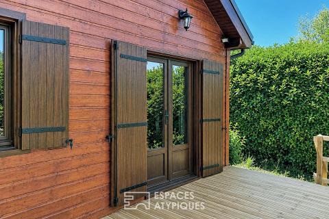 Chalet en bois avec terrasse et vue lac