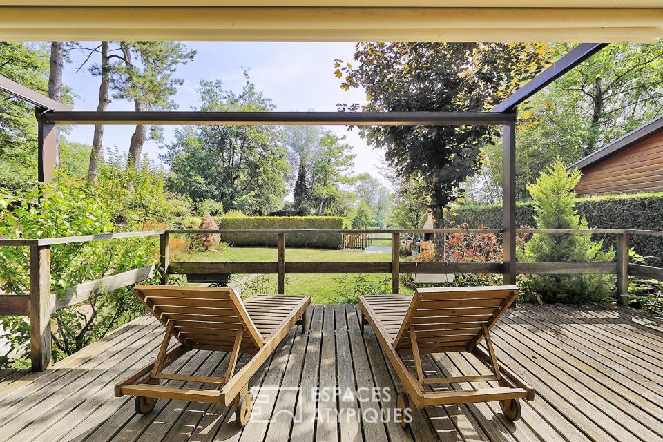 Maison en bois avec jardin et belle vue lac