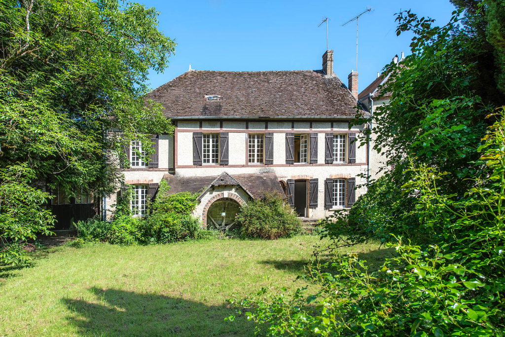 Ancien moulin à revisiter et son île