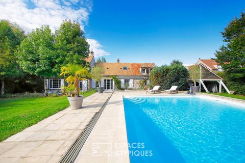 Belle longère avec piscine dans son écrin de verdure