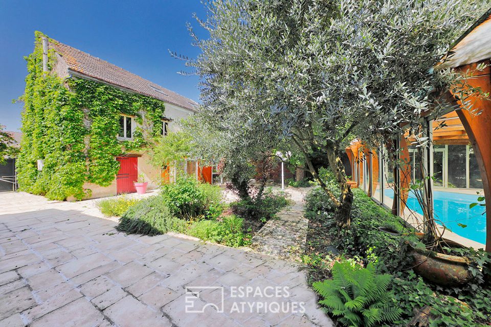 Maison de caractère avec grange aménagée, jardin arboré et piscine près de Meaux