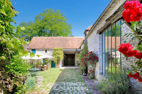 Propriété du XIXe avec maison d’amis, dépendances et jardin paysager
