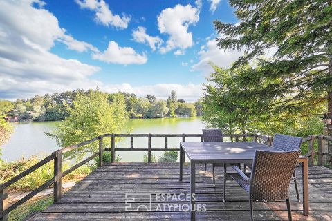 Chalet en bois avec terrasse et vue lac