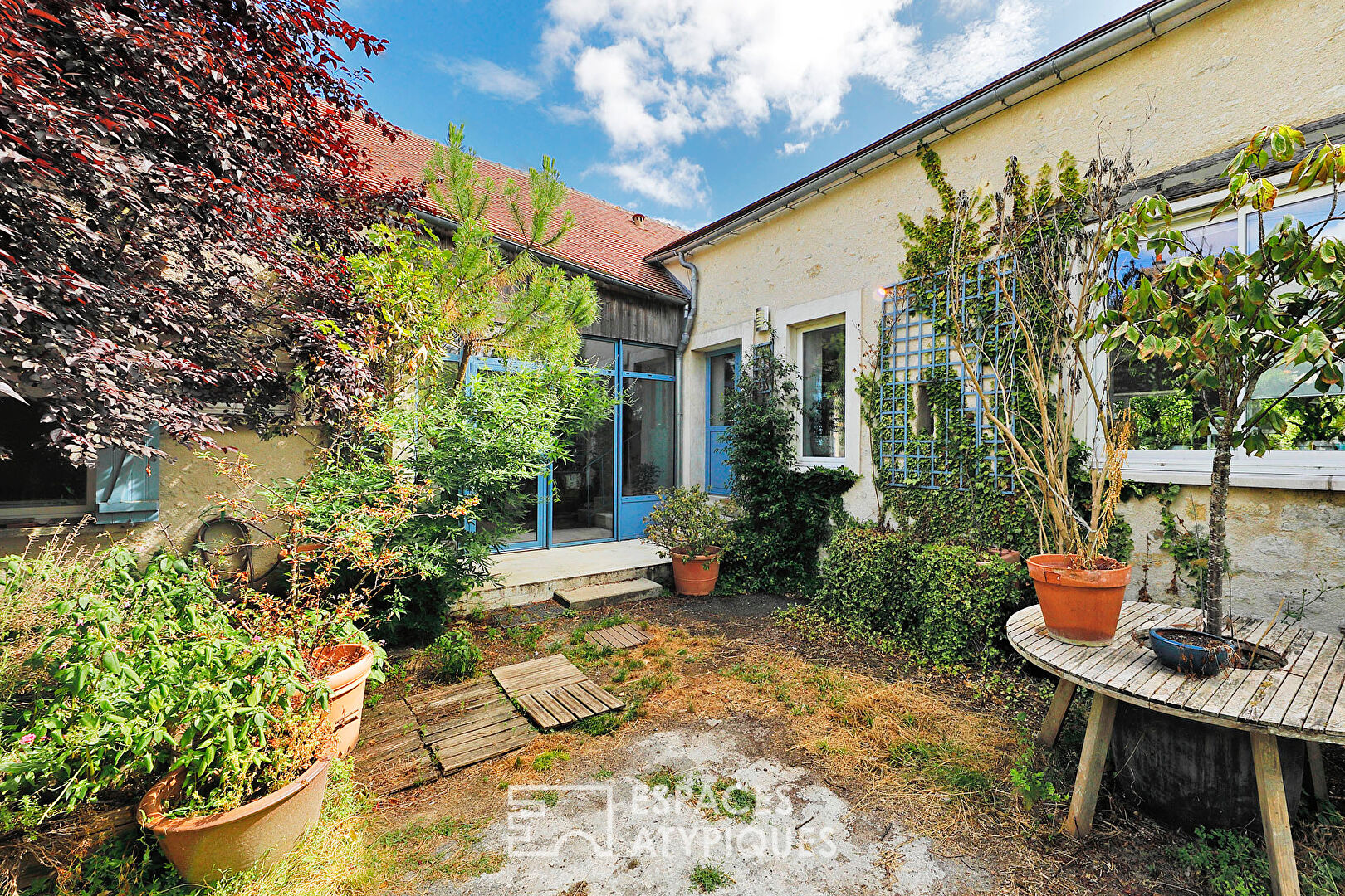 Maison de campagne rénovée avec son jardin bucolique