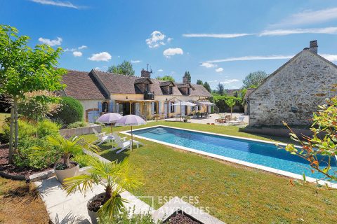 Renovated farmhouse with outbuilding and swimming pool