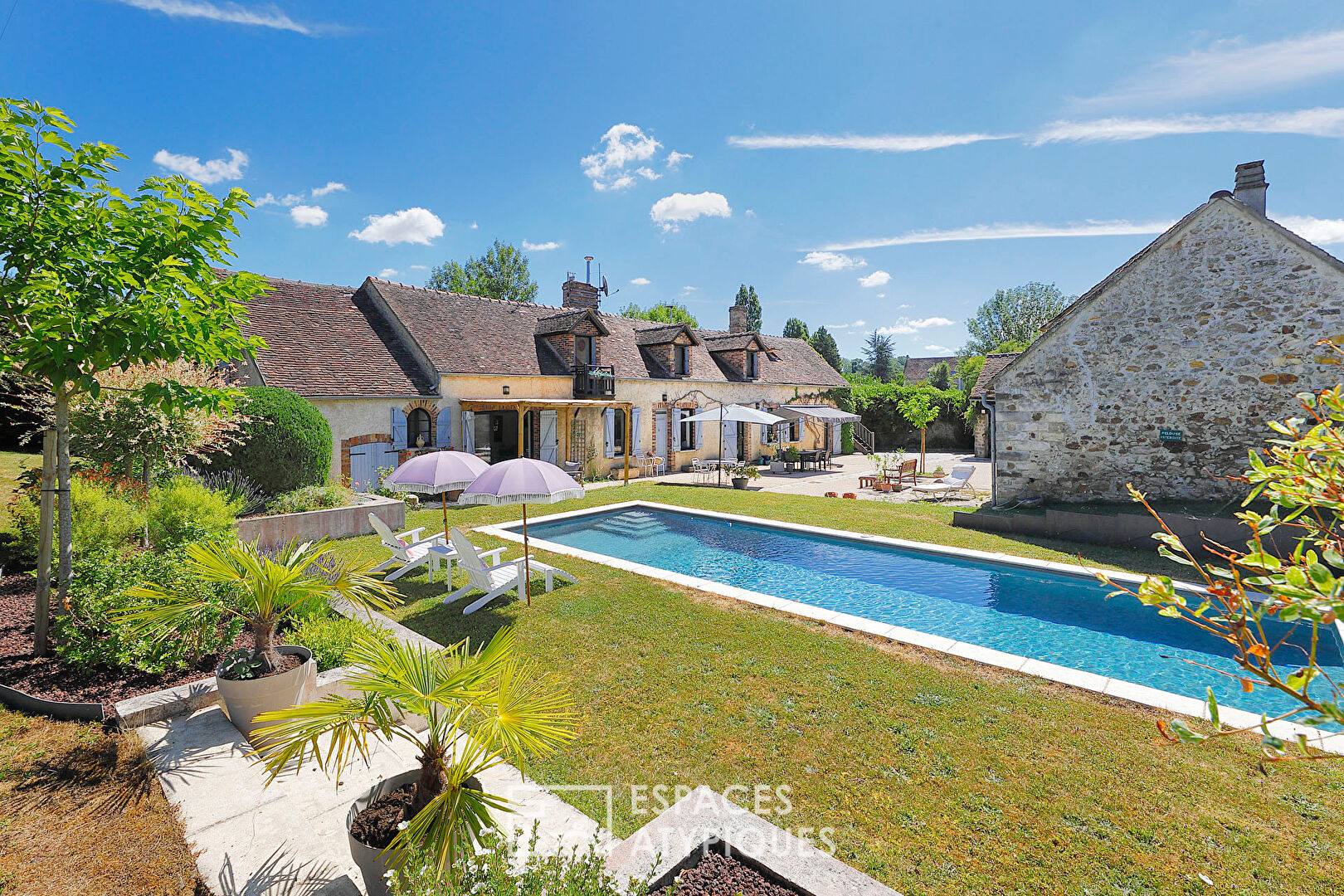 Renovated farmhouse with outbuilding and swimming pool