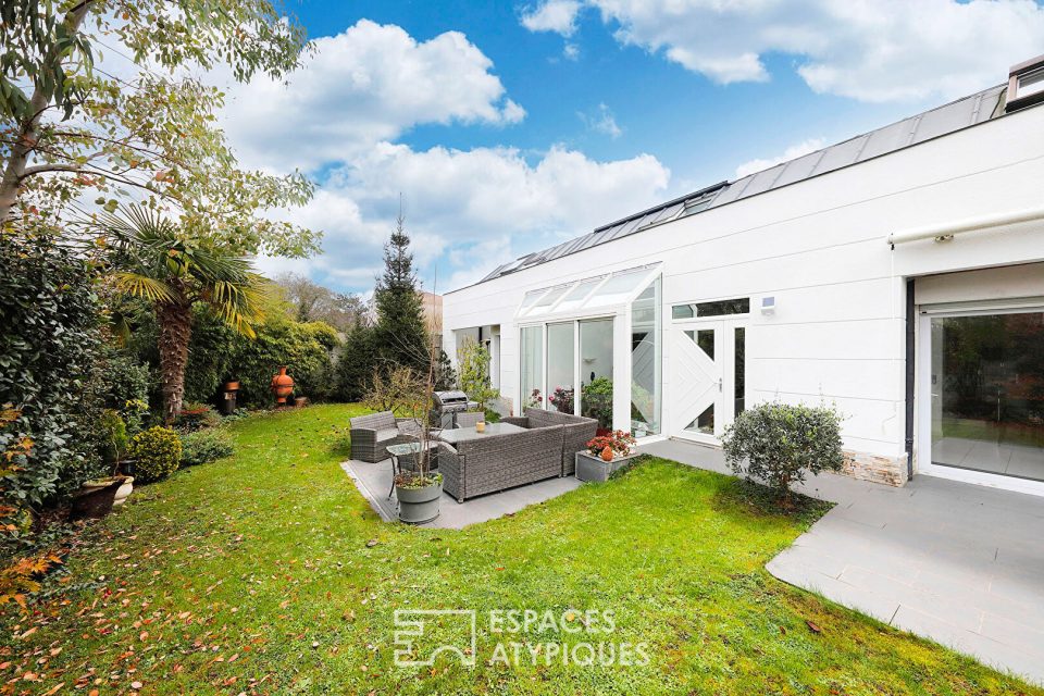 Maison d'architecte et son jardin paysager en centre ville