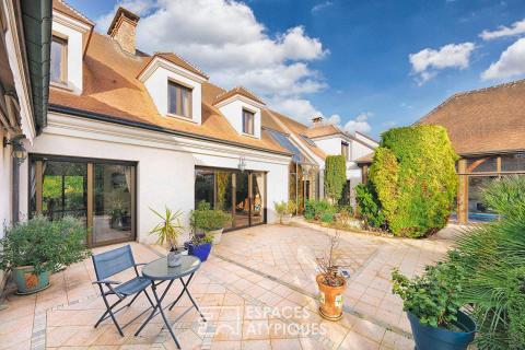 Villa Prestige aux Volumes Spectaculaires en coeur de ville