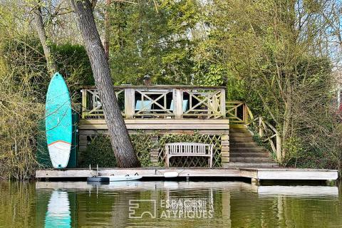 Chalet en bois rénové avec terrasse, jacuzzi et vue lac