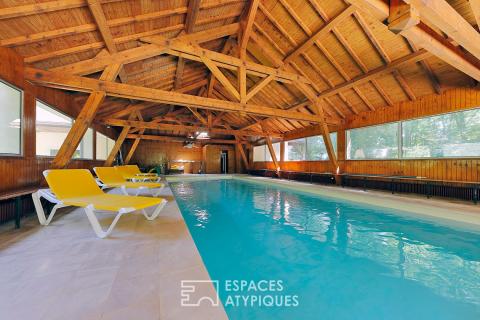 Propriété d&rsquo;exception avec parc, piscine intérieure et tennis