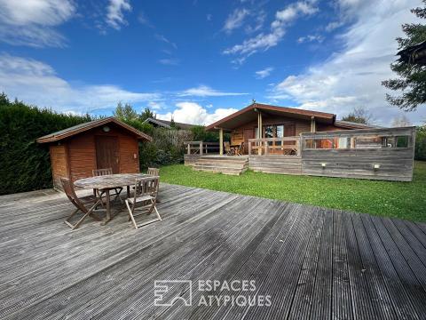 Maison en bois rénovée avec terrasses et vue
