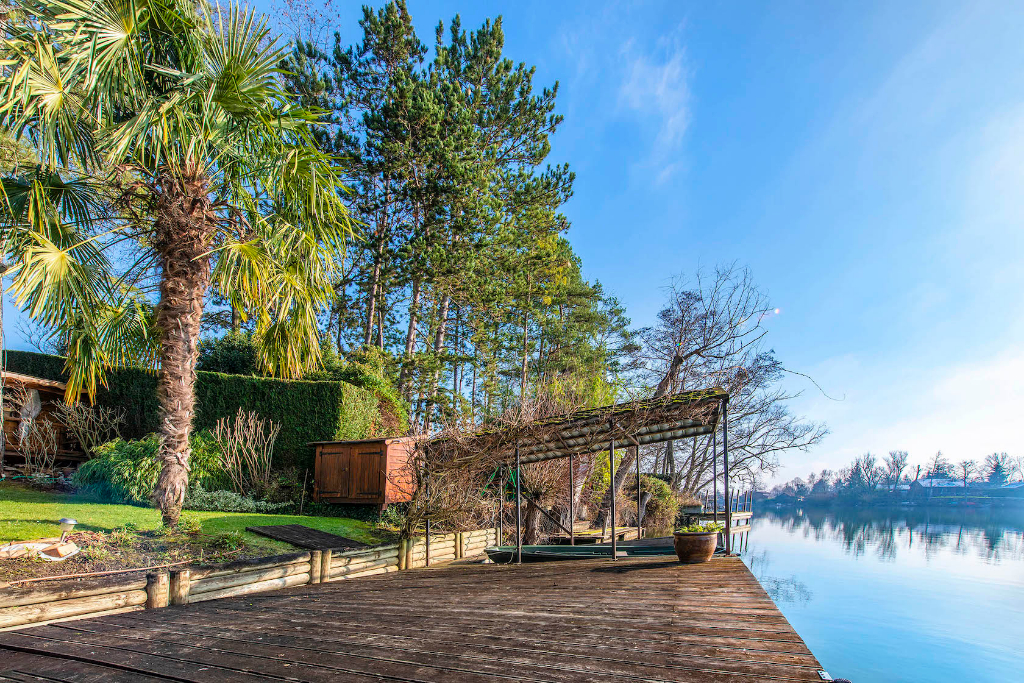 Maison ossature bois avec vue imprenable sur un lac