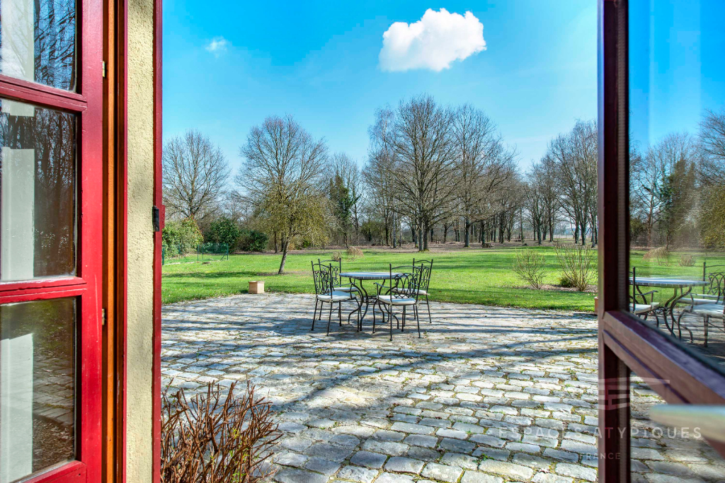 Maison familiale et son parc arboré