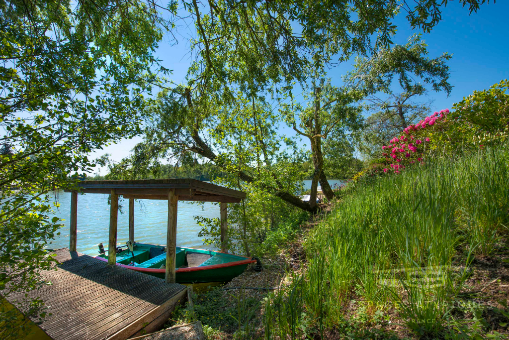 Two houses with stunning views of a lake