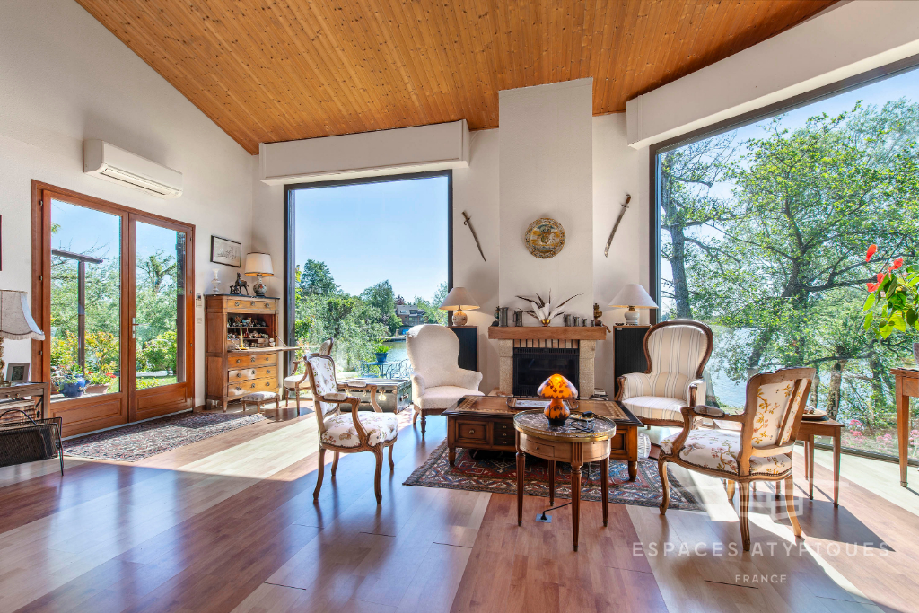 Two houses with stunning views of a lake