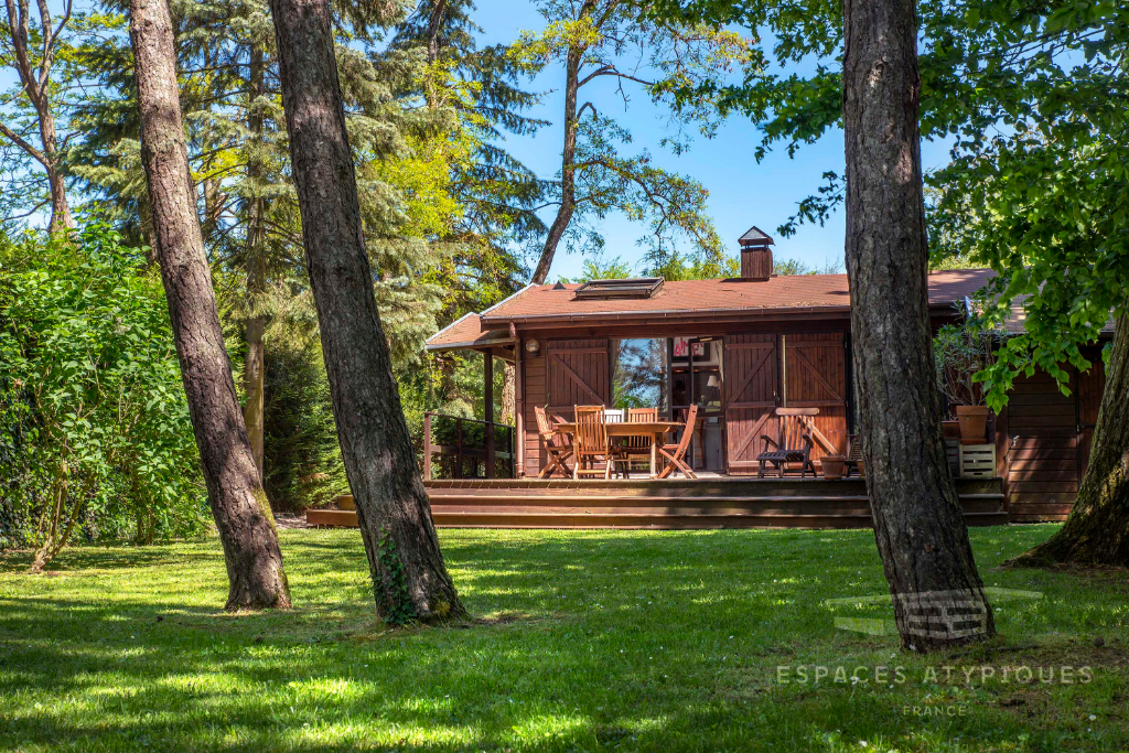 Maison ossature bois et sa vue imprenable sur un lac