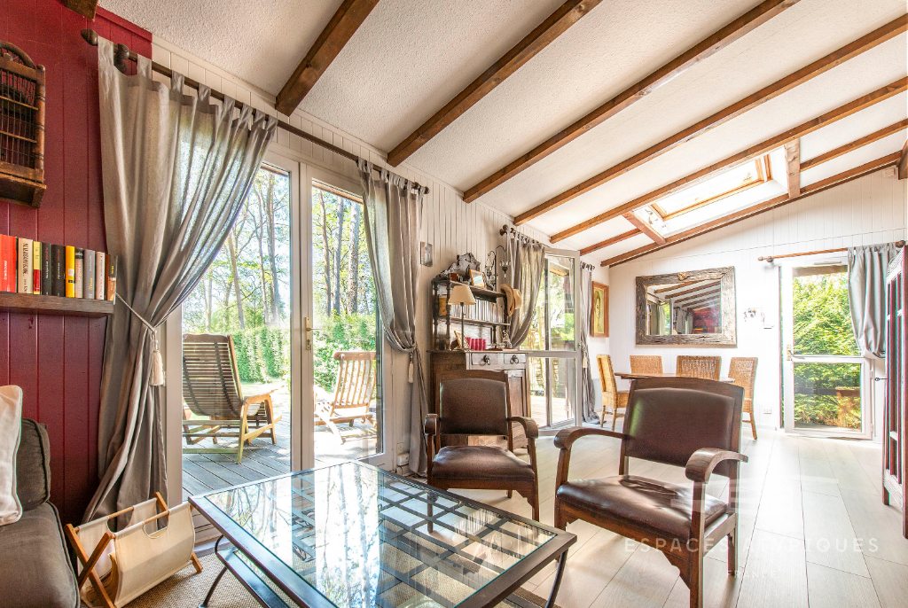 Maison ossature bois et sa vue imprenable sur un lac