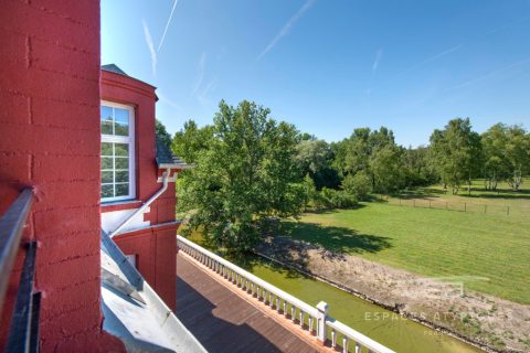 Duplex in a castle and its park