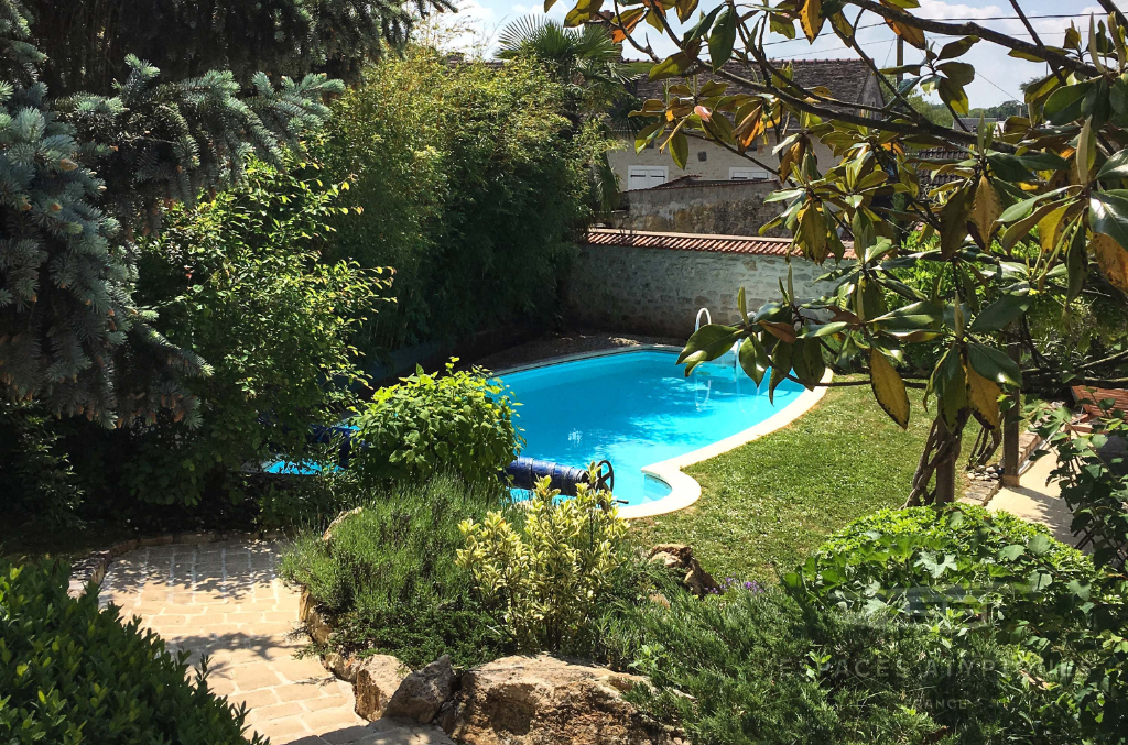 Charming stone house with pool and outbuilding