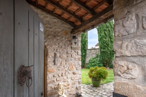 Stone house with outbuilding