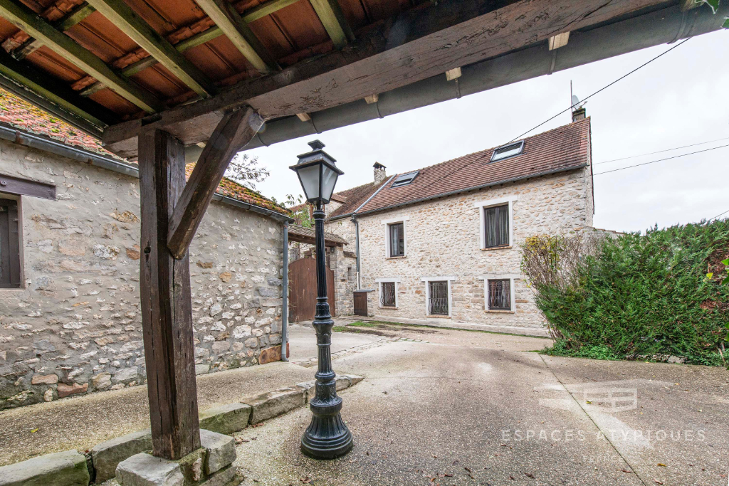 Stone house with outbuilding