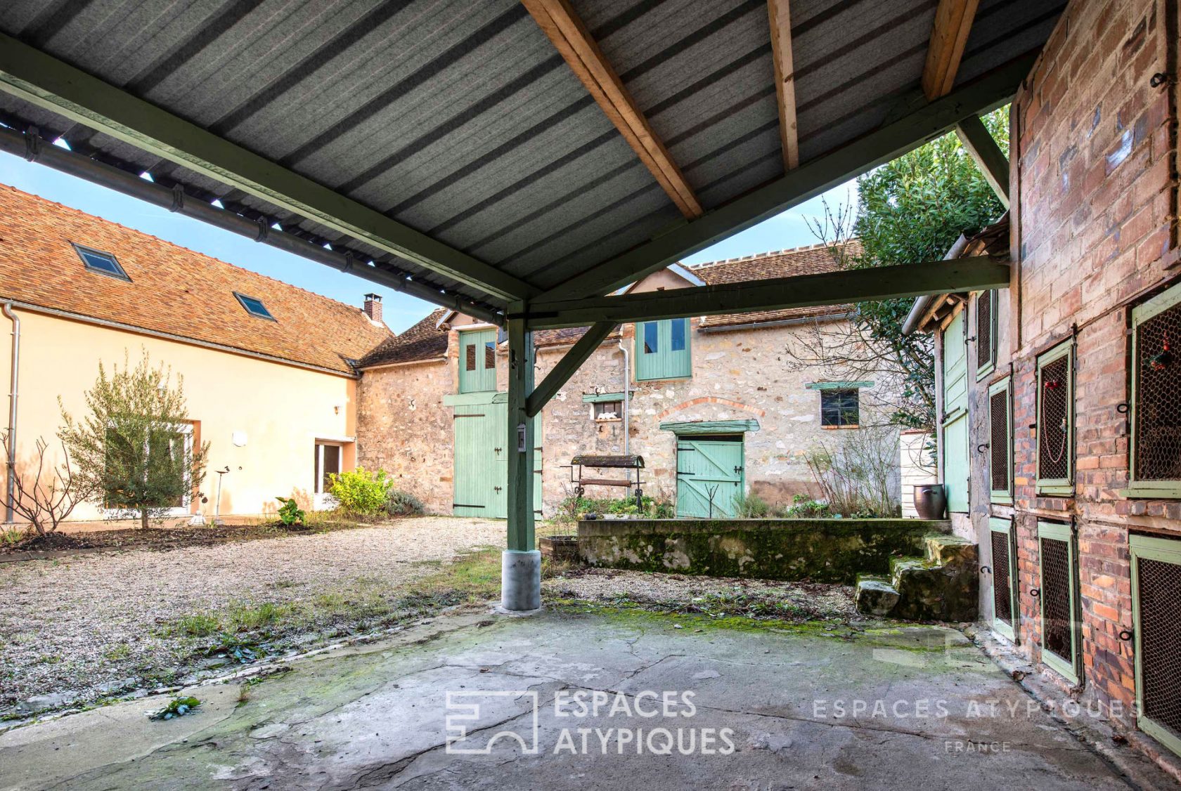 Renovated farmhouse with outbuildings