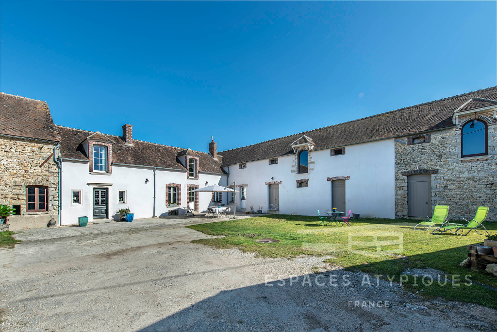Farmhouse renovated country style “chic” with outbuildings.