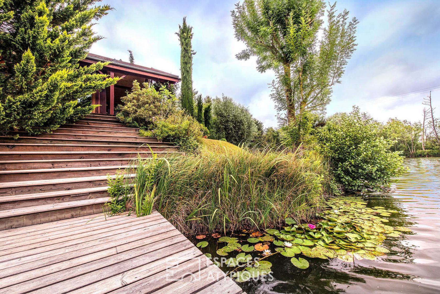 Wooden frame house with breathtaking view of a lake