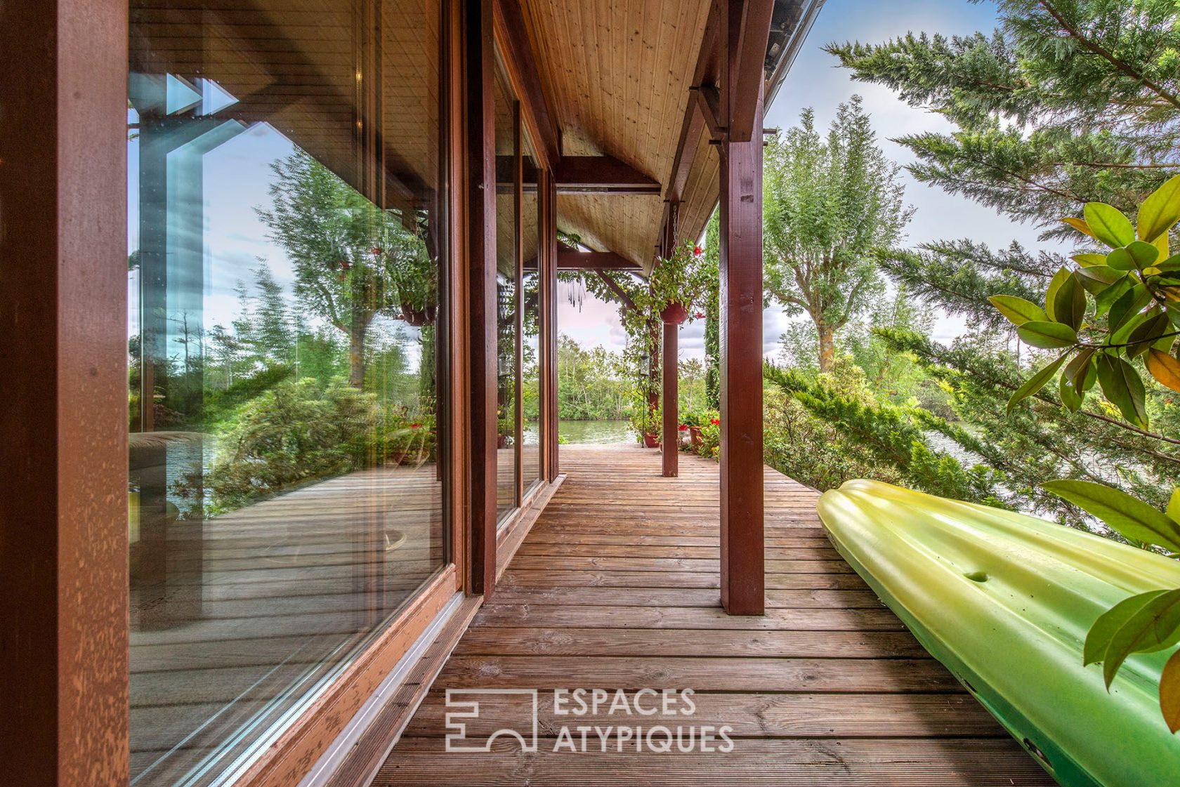 Wooden frame house with breathtaking view of a lake