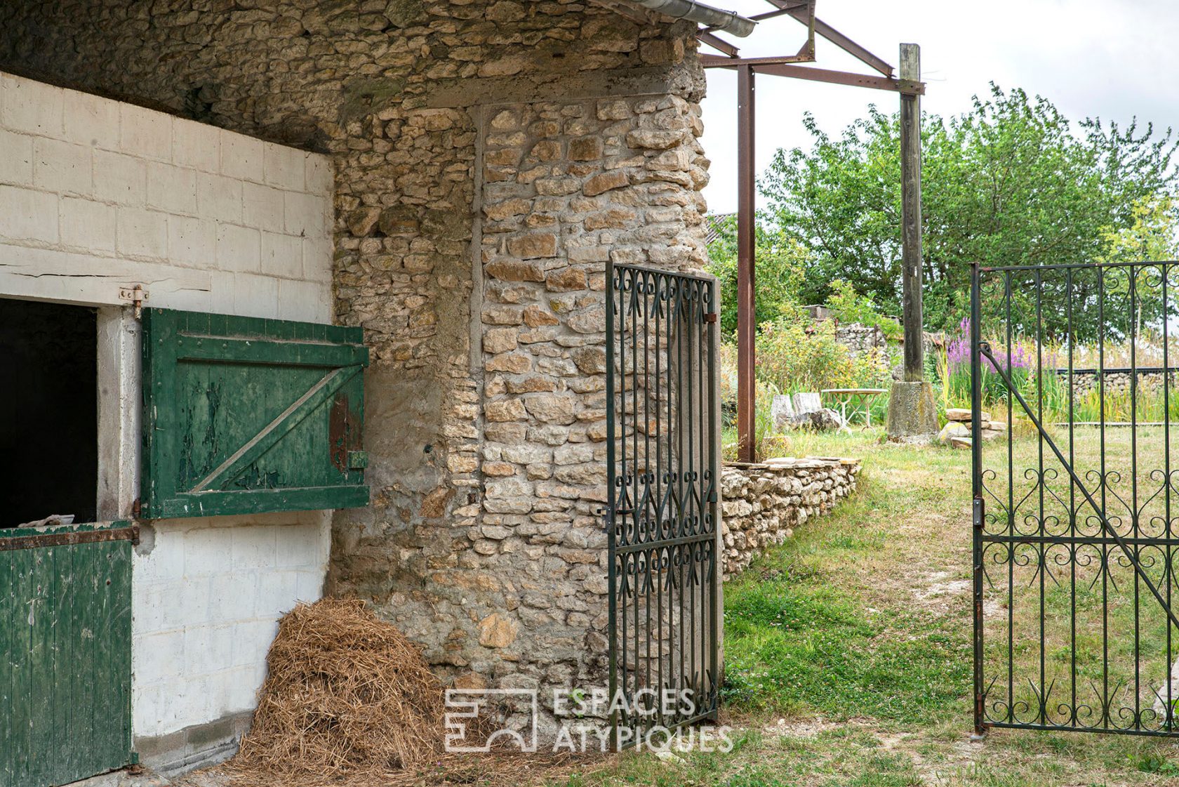 Farm building with outbuildings and mature garden