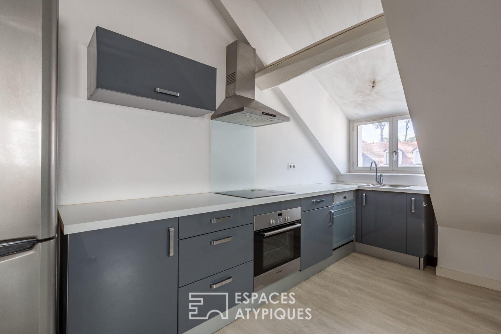 Appartement deux pièces de charme sous les toits