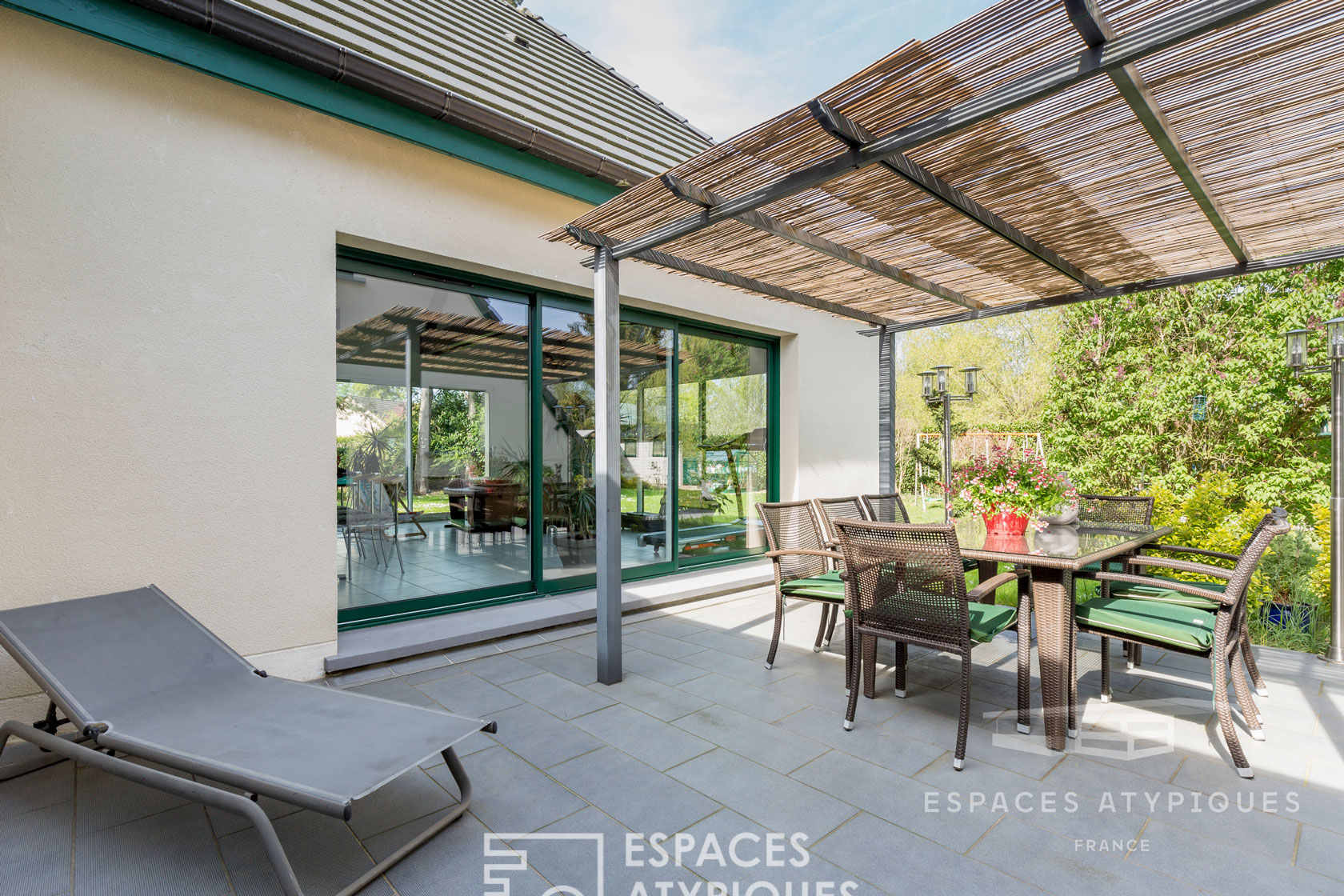 House with contemporary extension and garden