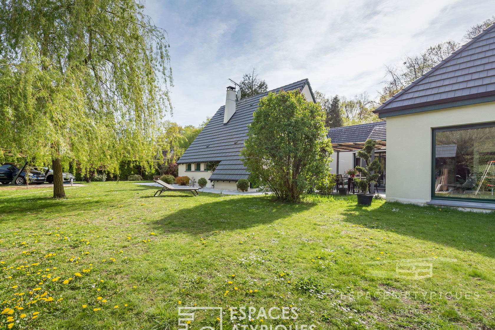 House with contemporary extension and garden