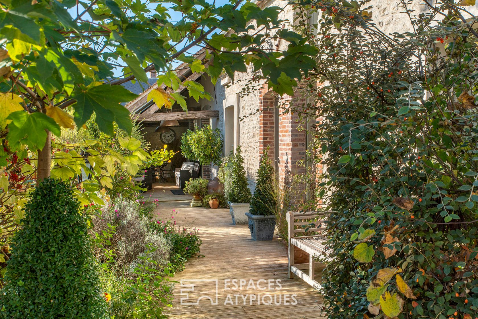 Charming renovated farmhouse with outbuildings and bucolic garden
