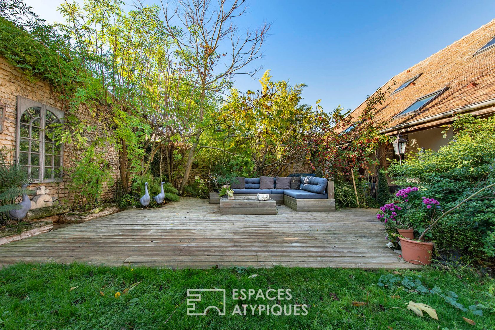 Charming renovated farmhouse with outbuildings and bucolic garden