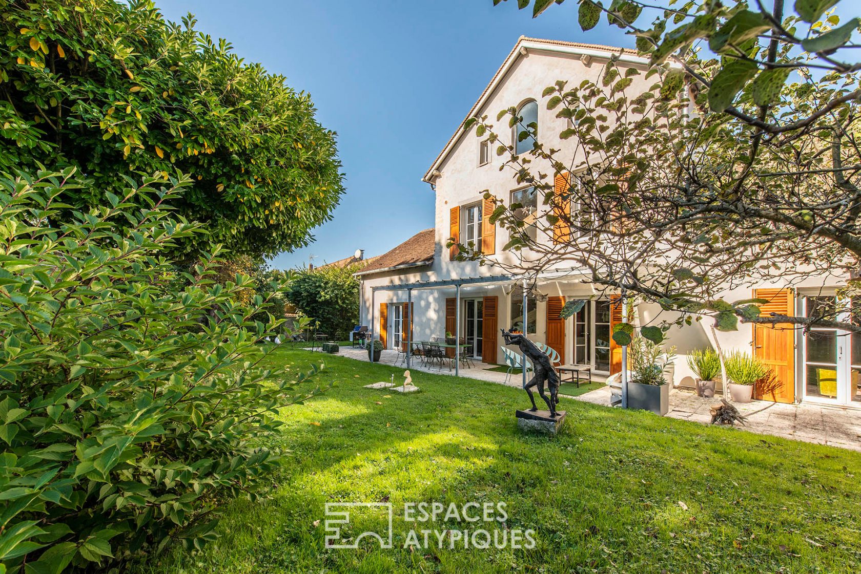 Character house with natural swimming pool and outbuilding