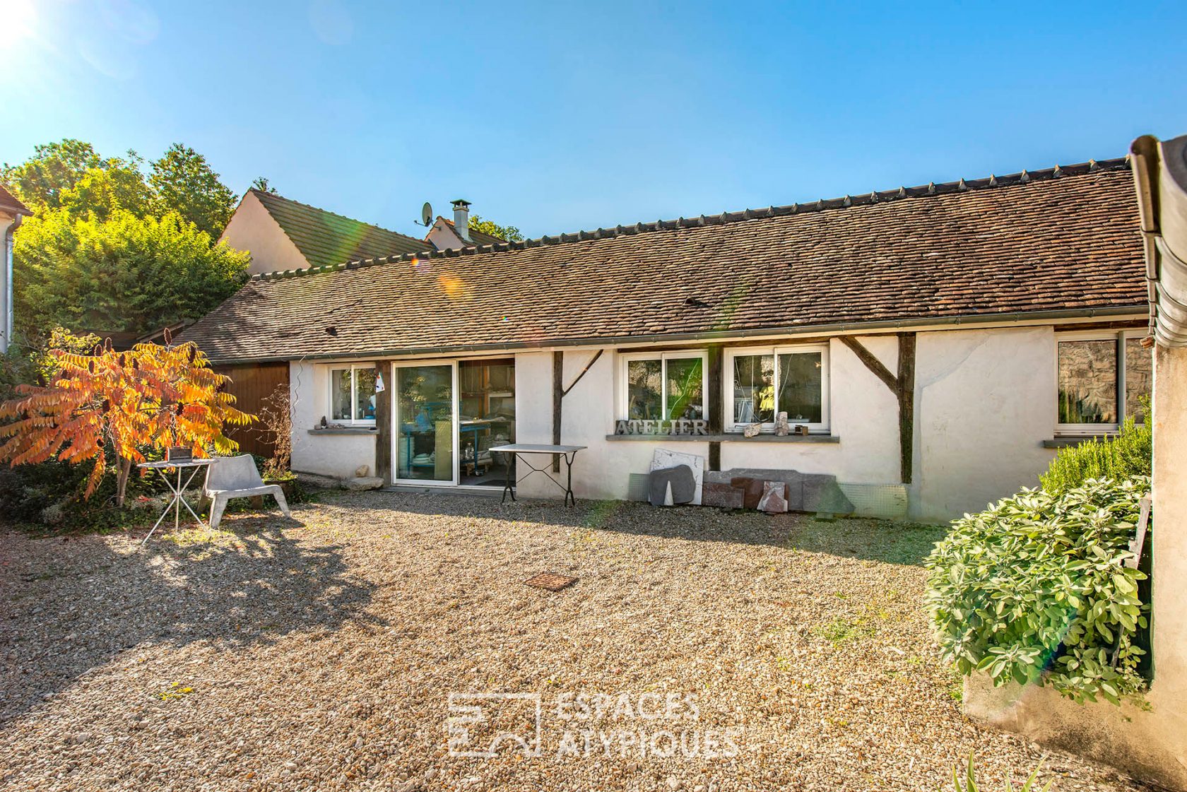 Character house with natural swimming pool and outbuilding