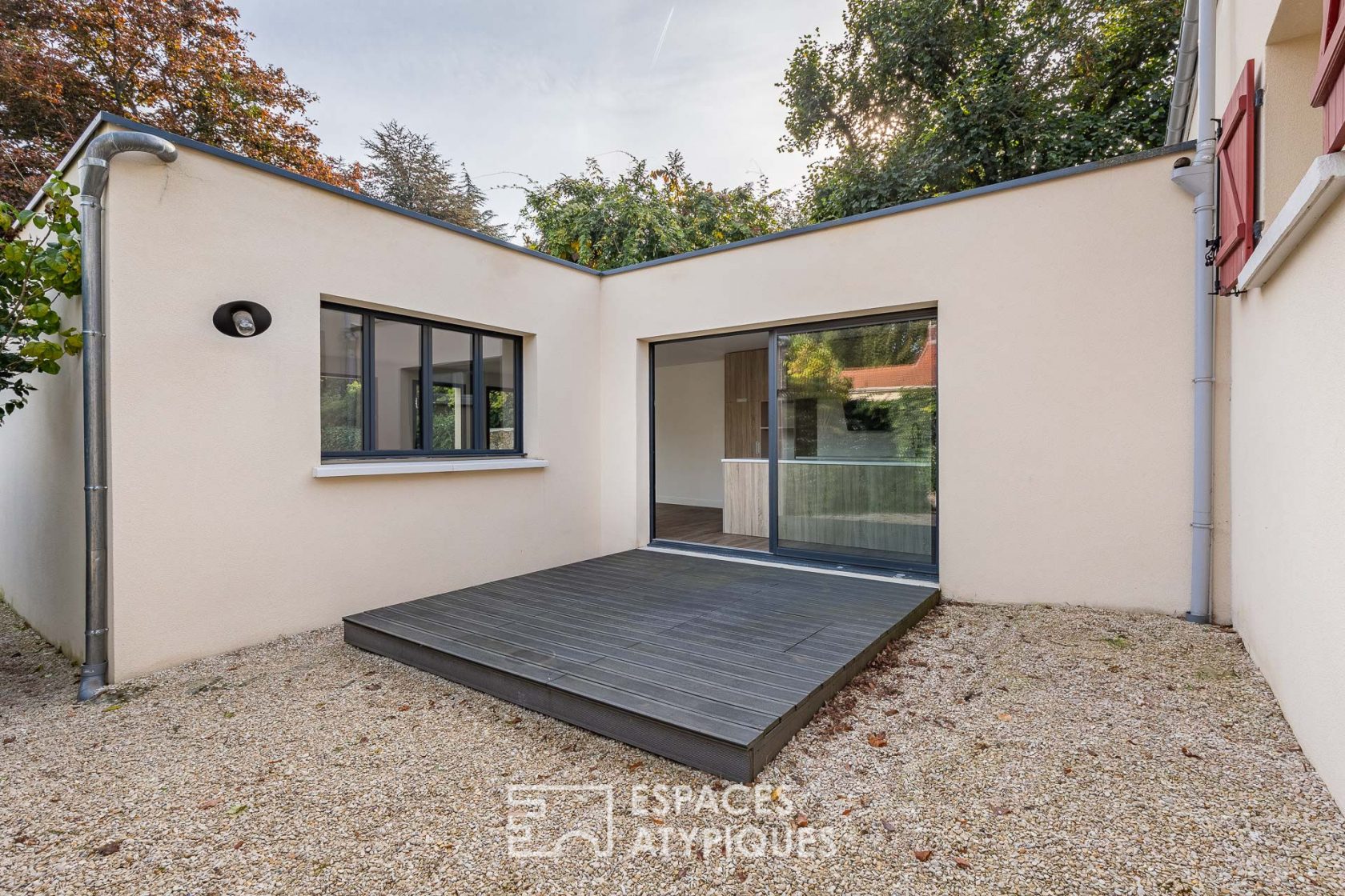 Townhouse with contemporary extension and garden