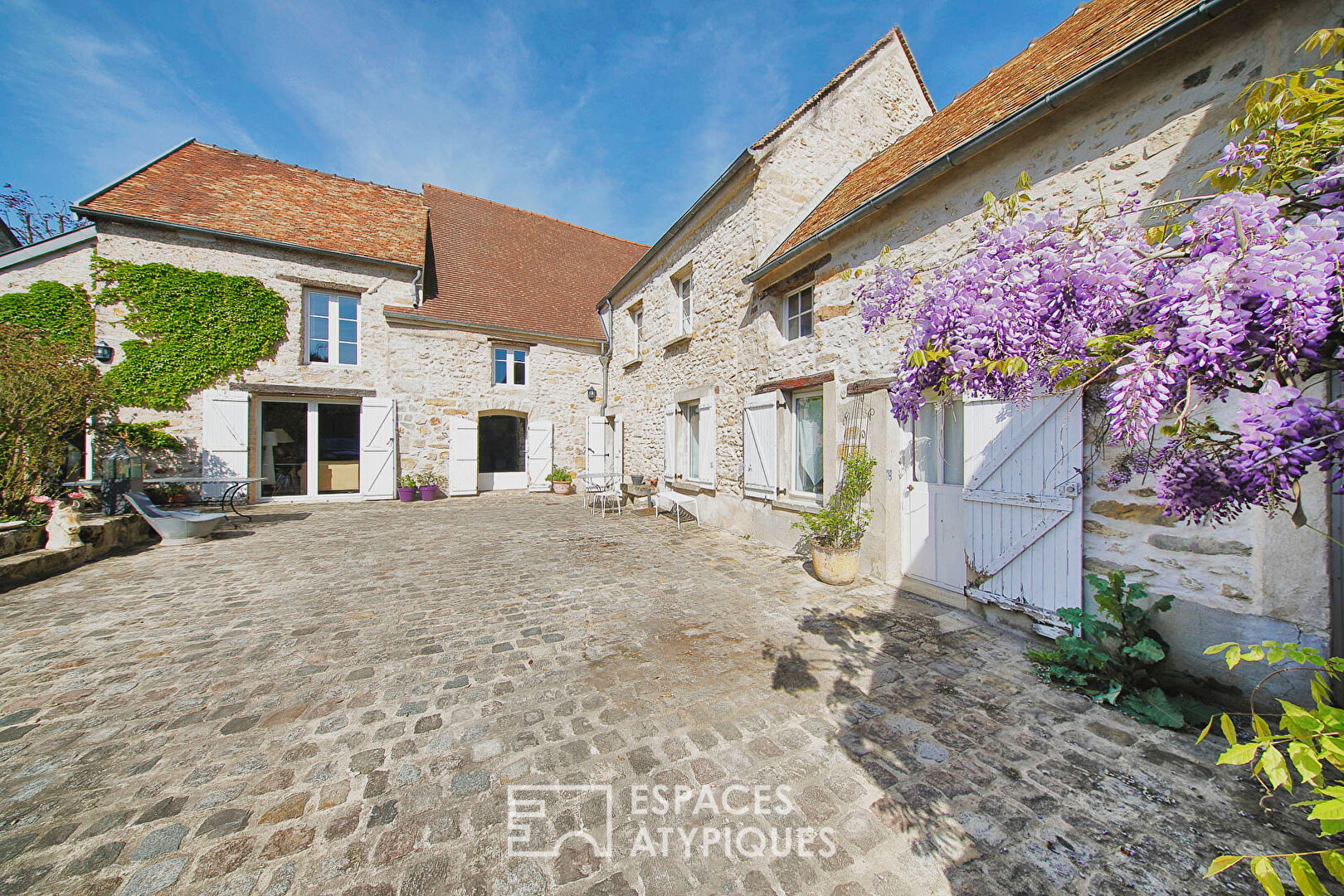 Charming renovated house with stream and garden