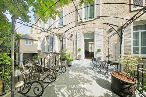 Haussmann-style apartment with garden by the river